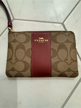 Coach Brown Signature Canvas Wristlet with Burgundy Center Stripe
